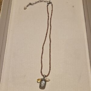 Delicate Brown Bead Necklace with Silver Filigree Pendant and Gem Charms